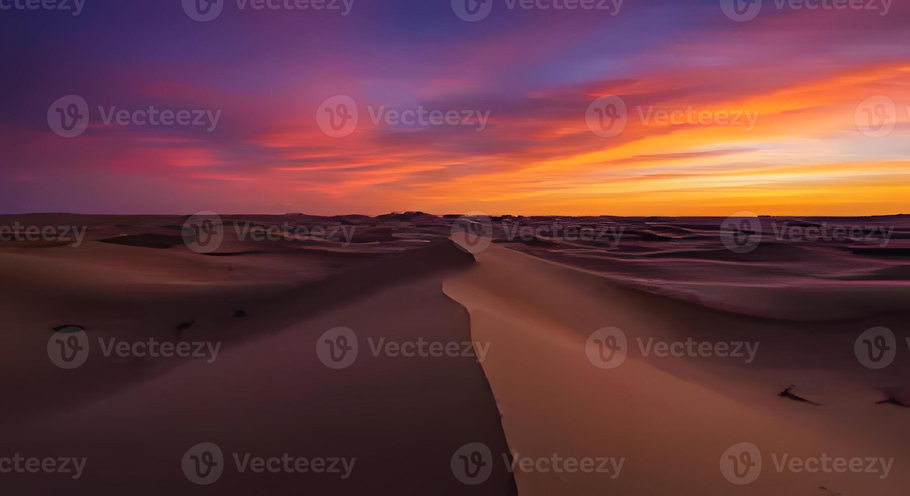 A captivating desert scene at sunset, showcasing rolling sand dunes and a sky transitioning through warm hues. Sunset Over Rolling Desert Dunes photo
