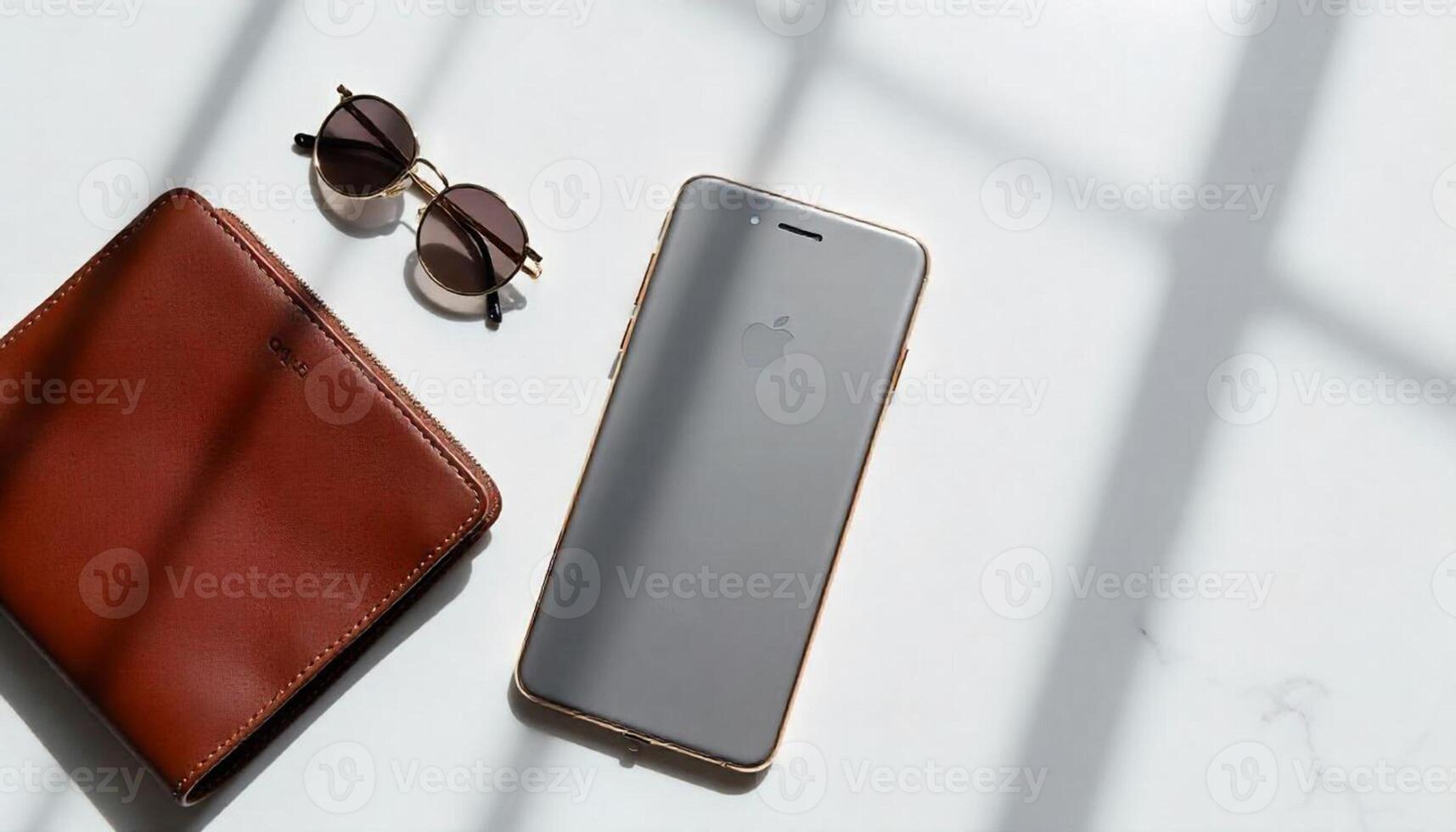 A leather wallet, sunglasses and an iphone on a table photo