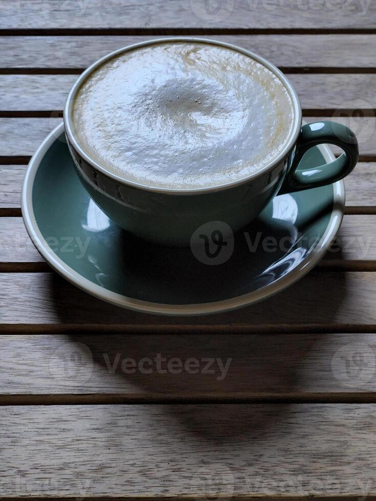 Hot coffee. Brewed coffee in a ceramic cup photo