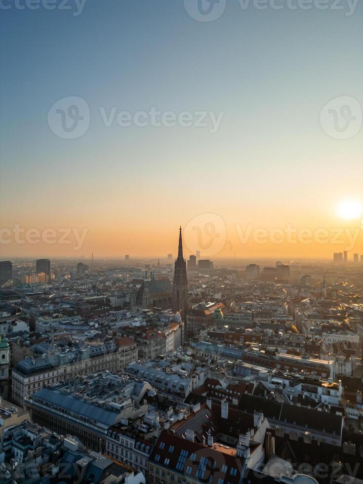Vienna cityscape with St. Stephen's Cathedral at sunset, aerial view photo