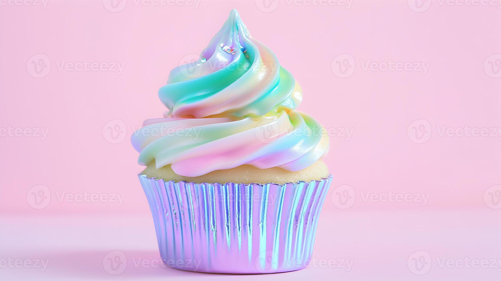 Holographic Cupcake with Rainbow Frosting on Pink Background photo