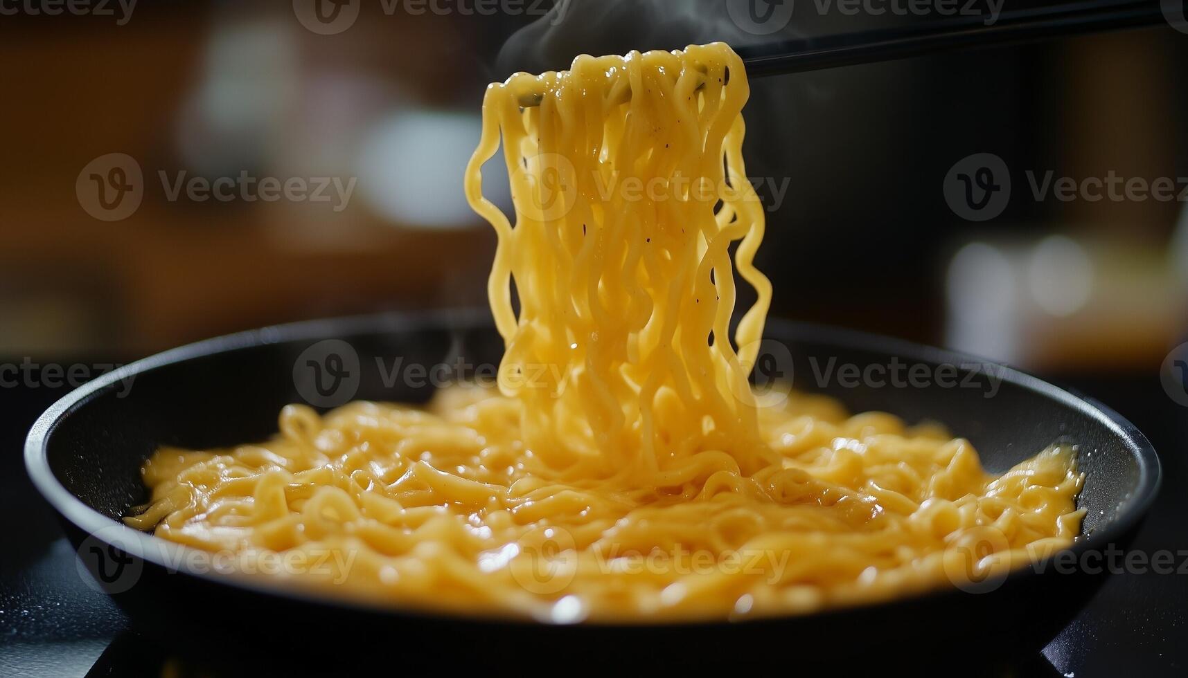 Delicious noodle cheese on black bowl with chopstick for simple lunch photo