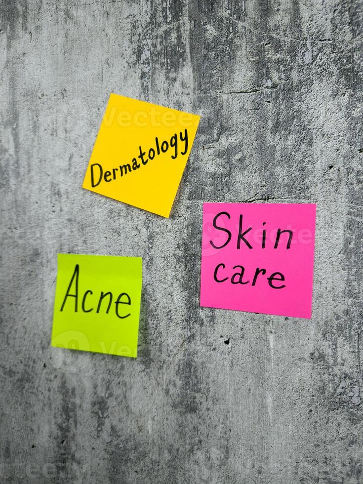 Skin care, important problem for people with epidermal defects. Bright stickers for notes with reminder to take care of your skin. Removal of acne and other skin defects photo
