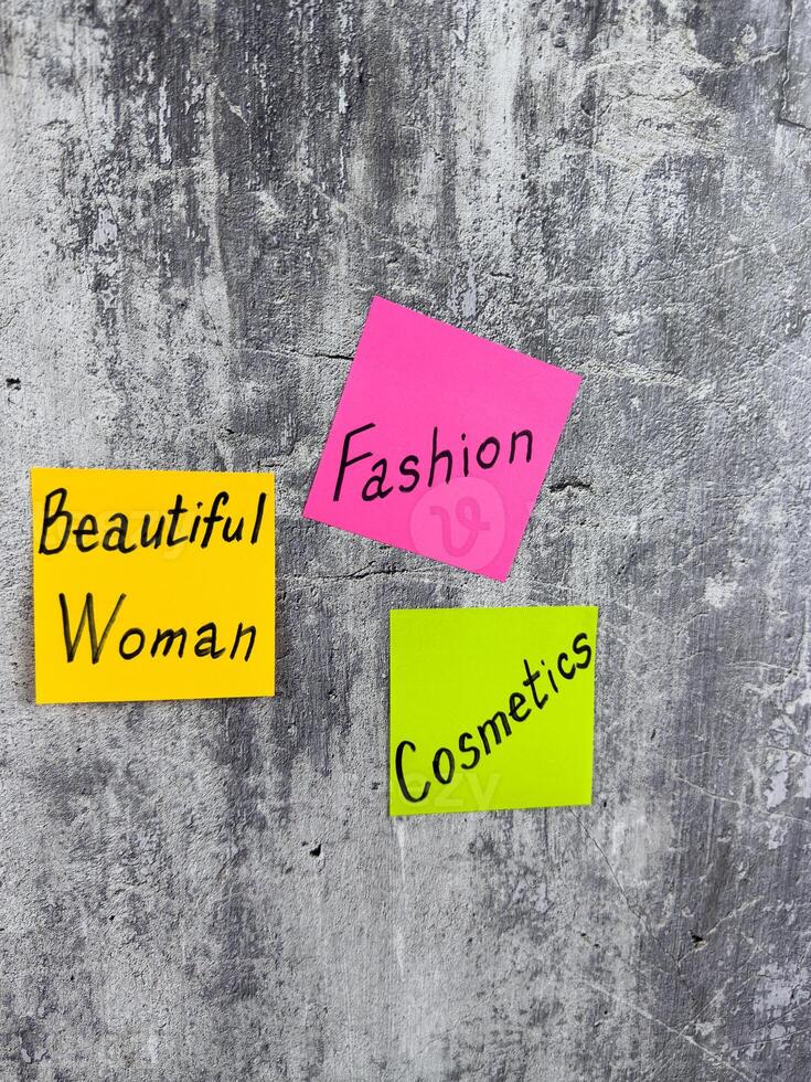 Stickers for notes with words about cosmetics. Conceptual photo about the importance of attractive appearance with the help of makeup and cosmetics for an irresistible image of fashion person