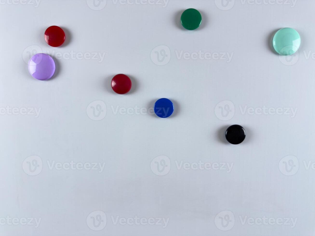 Whiteboard with magnets ready for attaching notes and reminders. Perfect for task planning and management in professional educational and home environments for self productivity photo