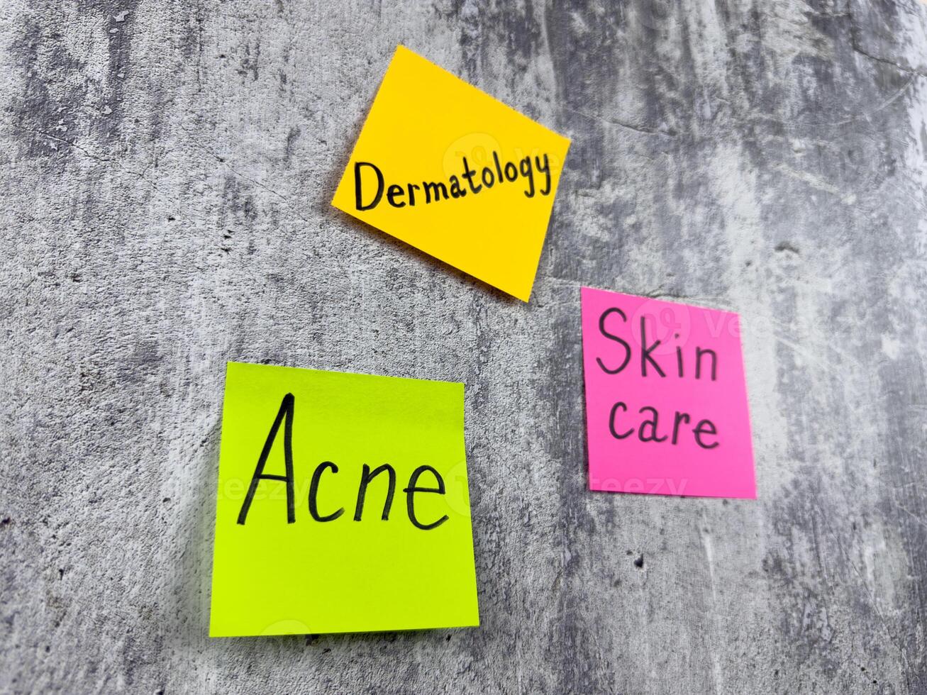 Acne concept. Common skin problem in adolescents. Sticky note reminding you of the importance of treating and healing the epidermis. Taking care of the largest human organ photo
