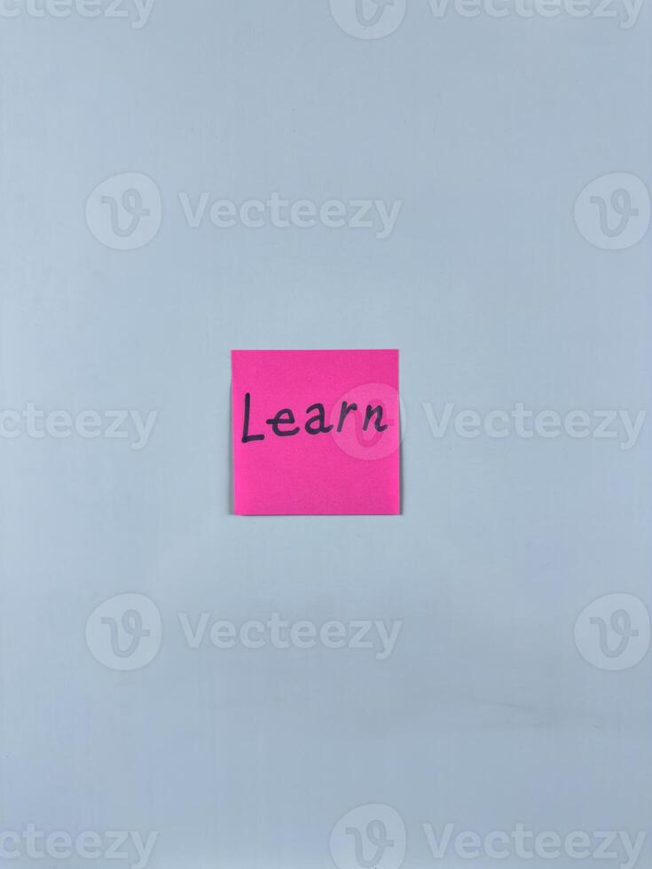 Vertical photo of sticky note with word Learn. Study and personal development, conceptual photo about importance of learning and personal development. Getting education and new knowledge