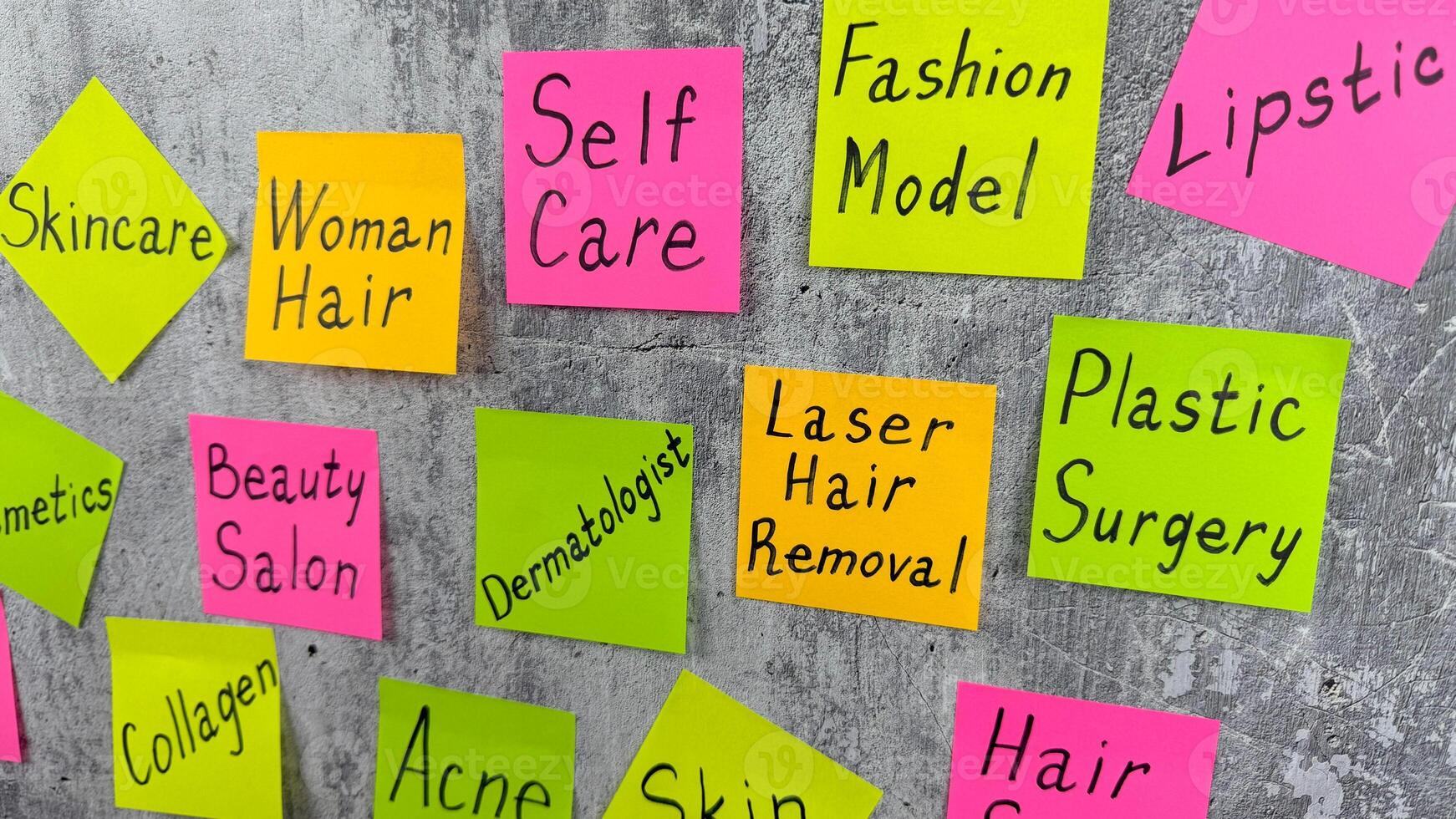 Colored sticky notes with to do list for fashion model. The complex business of the beauty industry to maintain healthy beauty. Taking care of your skin and body for an attractive image photo