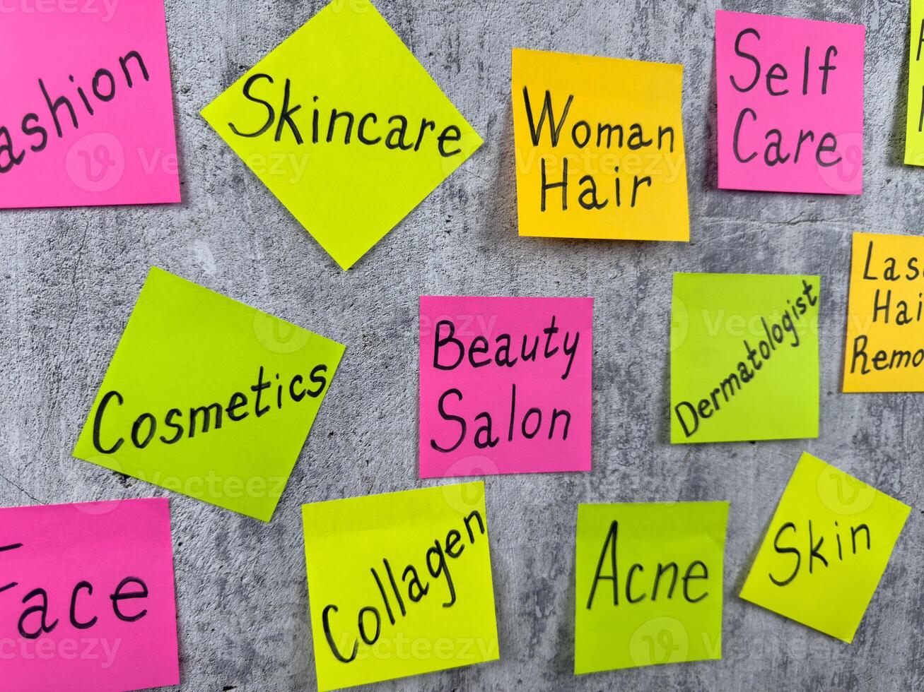List of words about fashion and beauty industry on bright stickers. Reminder about the difficulties of caring for your body. Importance of skin care and the difficulty of maintaining healthy beauty photo