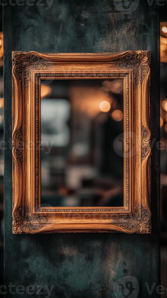 An old gold frame on a wall photo