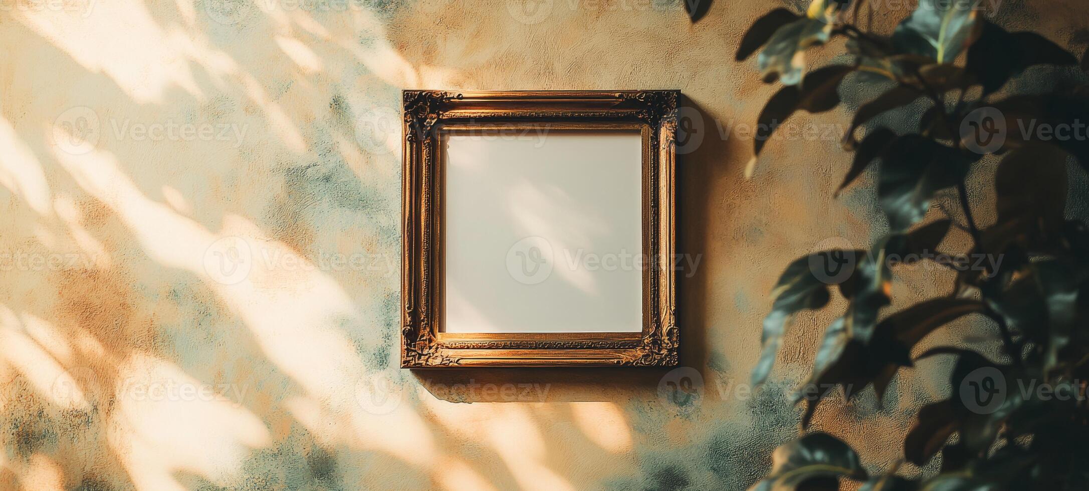An empty frame on a wall with a plant photo