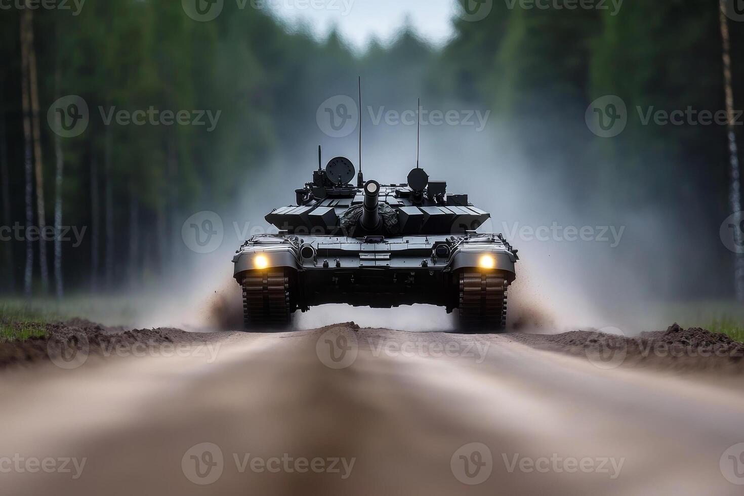 Tank driving on a muddy road surrounded by dense forest during a foggy morning photo