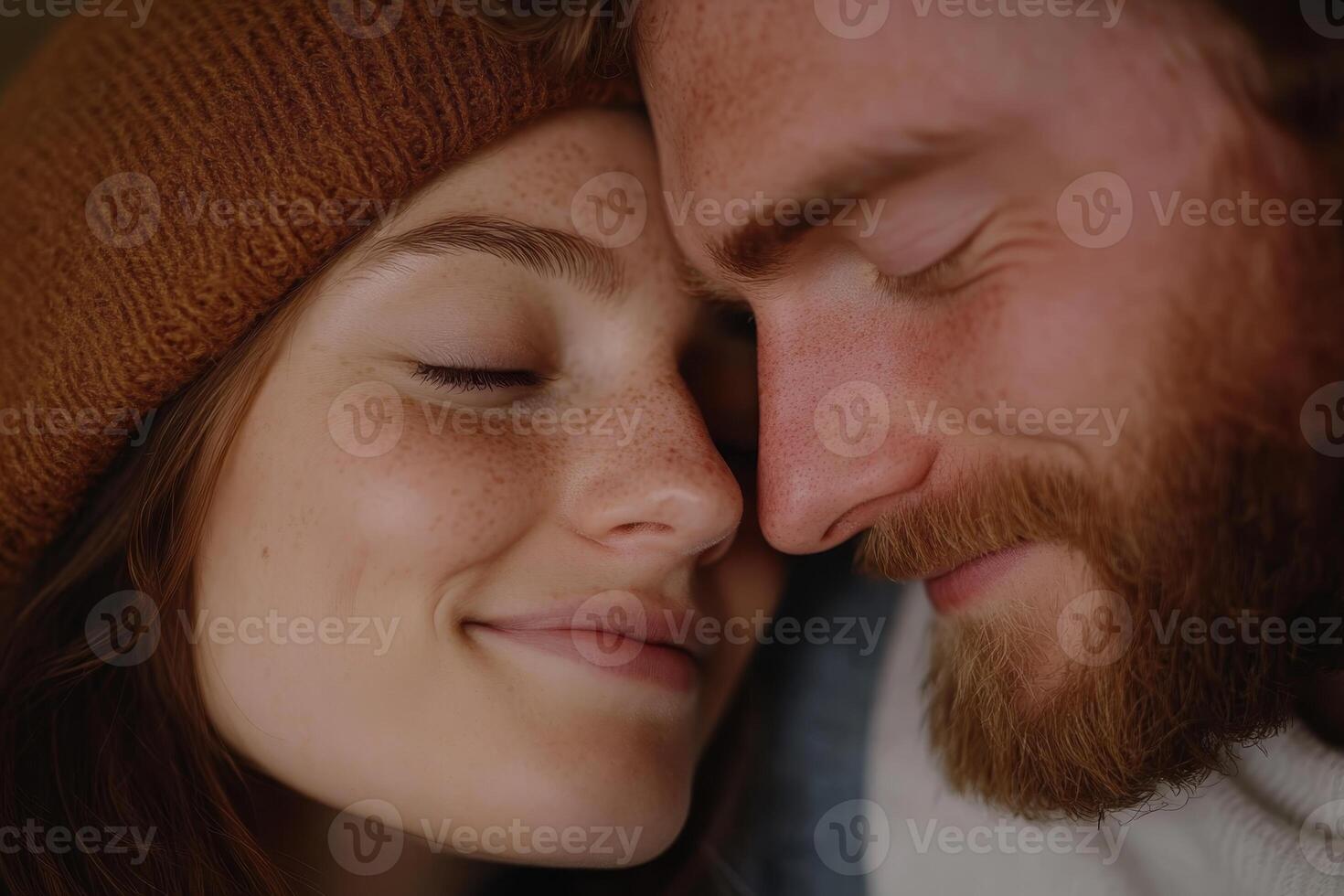 Close bond between two people sharing an intimate moment in a cozy setting during winter months photo