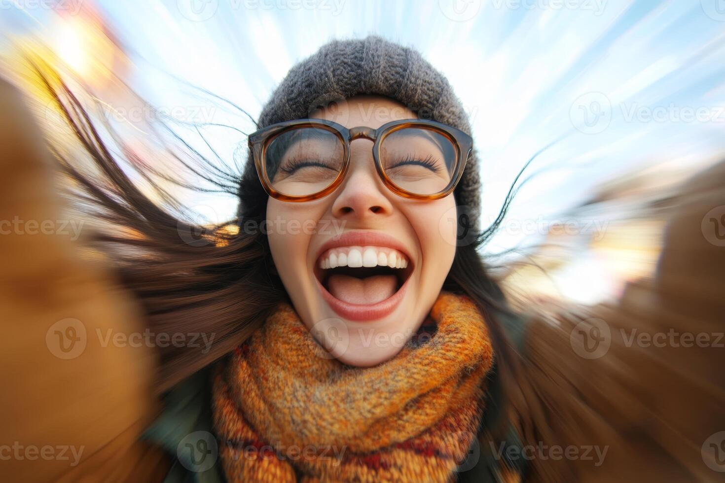 Enthusiastic woman enjoying a vibrant moment outdoors during a sunny day in a festive atmosphere photo