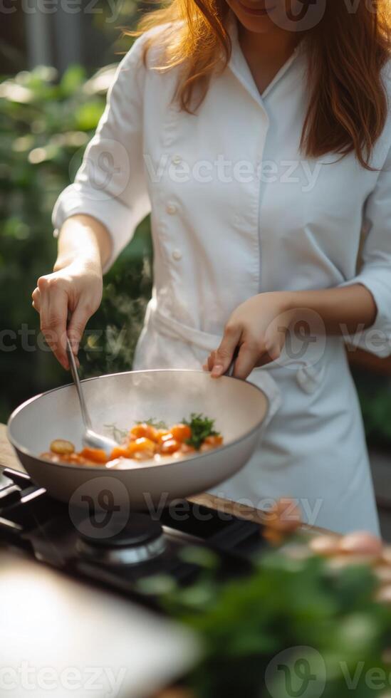 Cooking fresh vegetables in a sunny kitchen garden while wearing a chef's coat photo