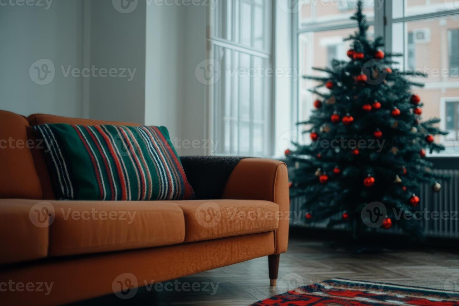 Cozy living room decorated for Christmas with a tree and festive ornaments in a warm, inviting setting photo