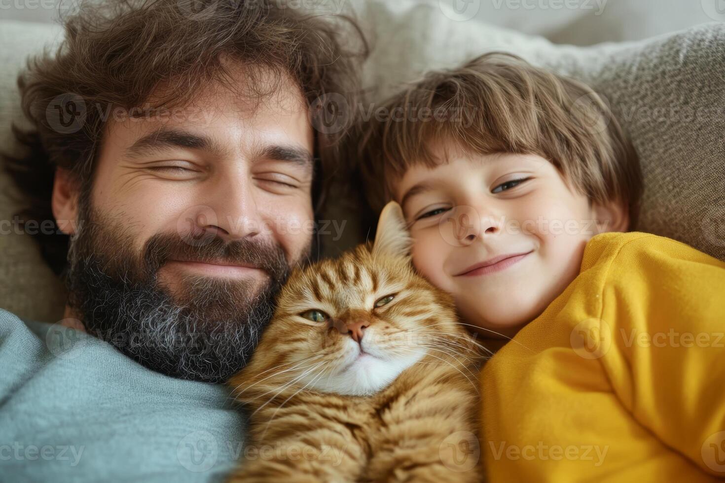 Family bonding time with a child and father cuddling a cat on a cozy sofa at home photo