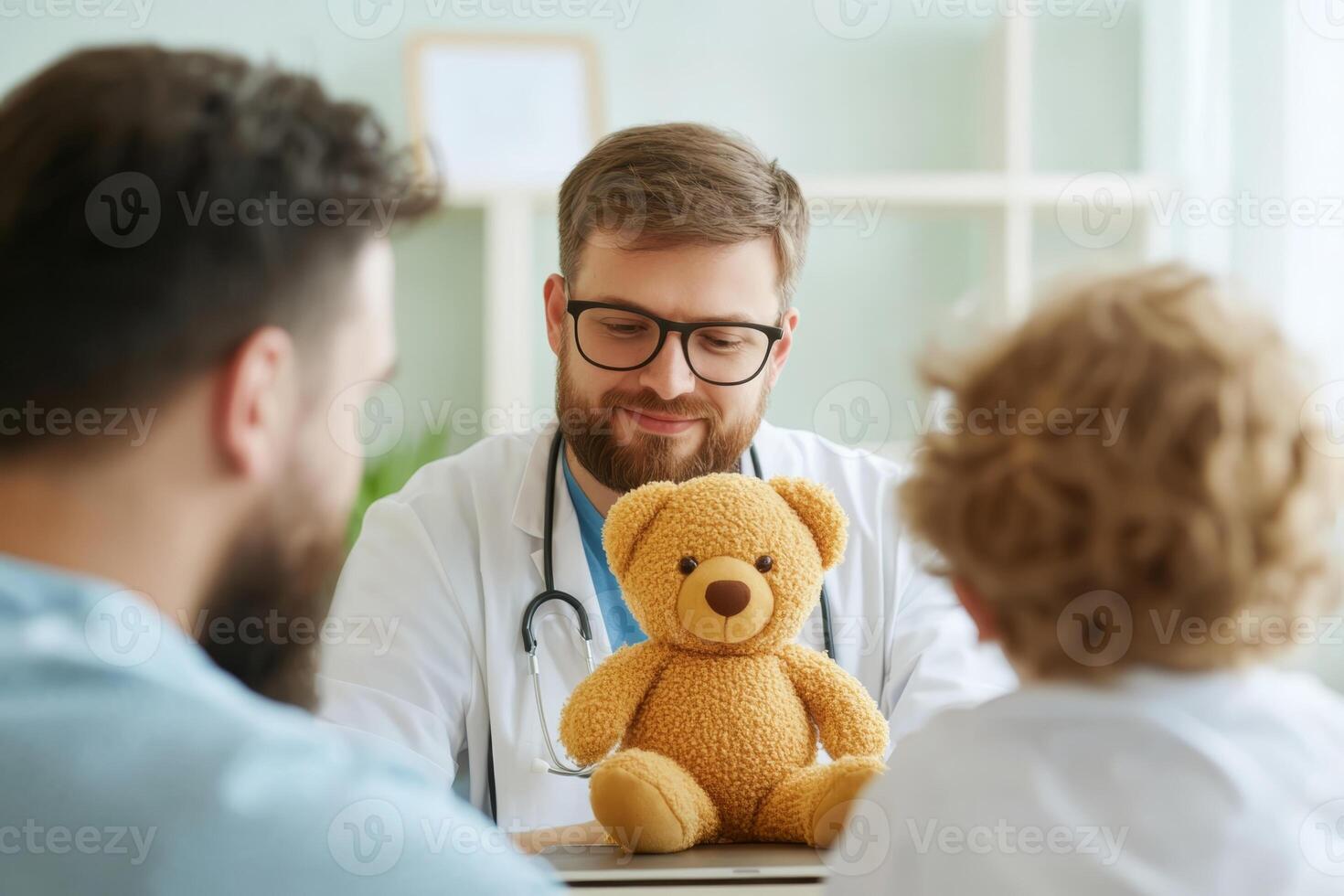 Doctor interacts with a child using a teddy bear during a consultation in a medical office setting photo