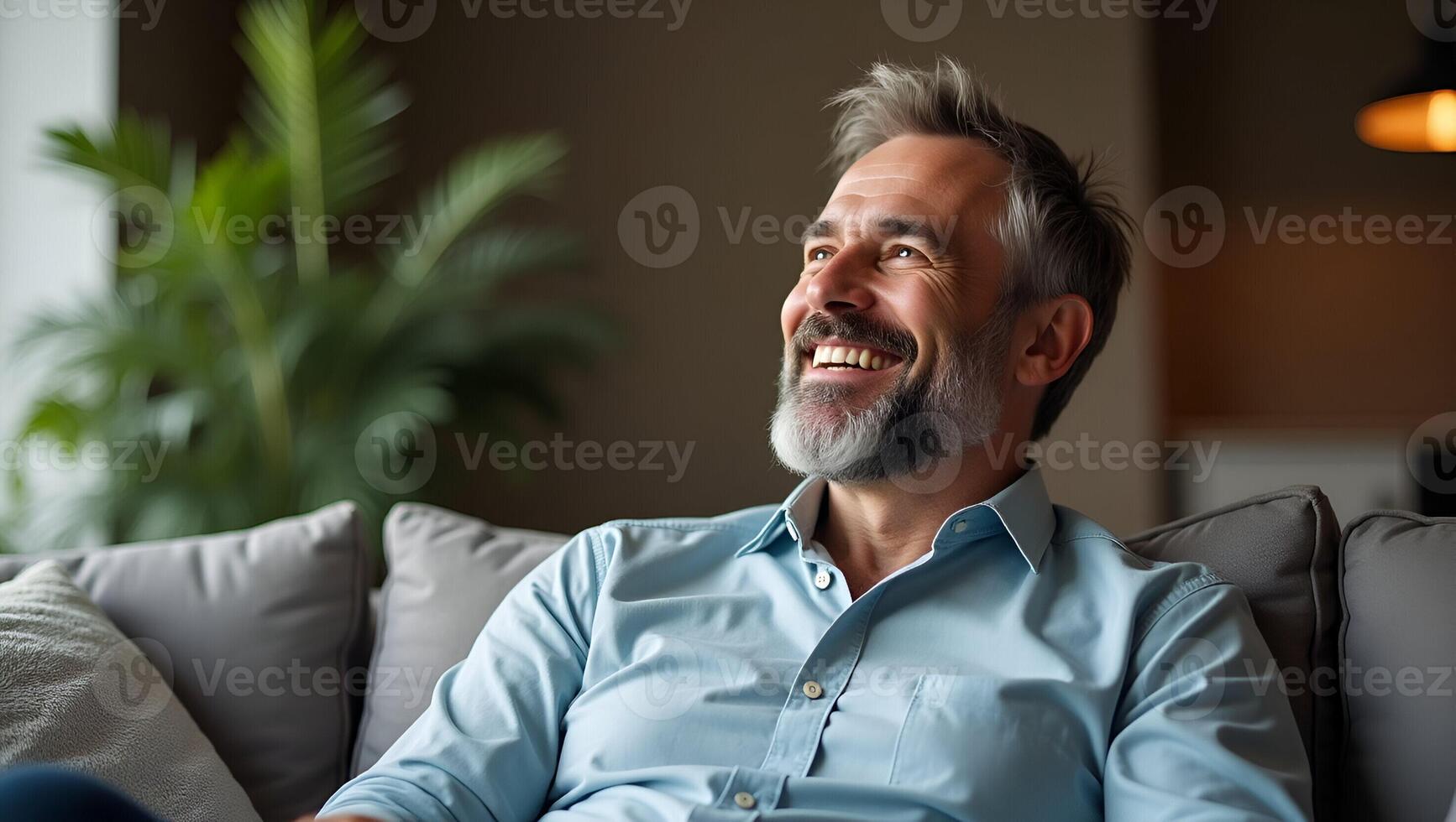 Serene Lifestyle Flat Relaxed 50 Year Old Bearded Man in Casual Shirt Radiating Comfort and Positivity at Home A Modern Interior Illustration of Personal Space and Restful Balan Realistic Set photo