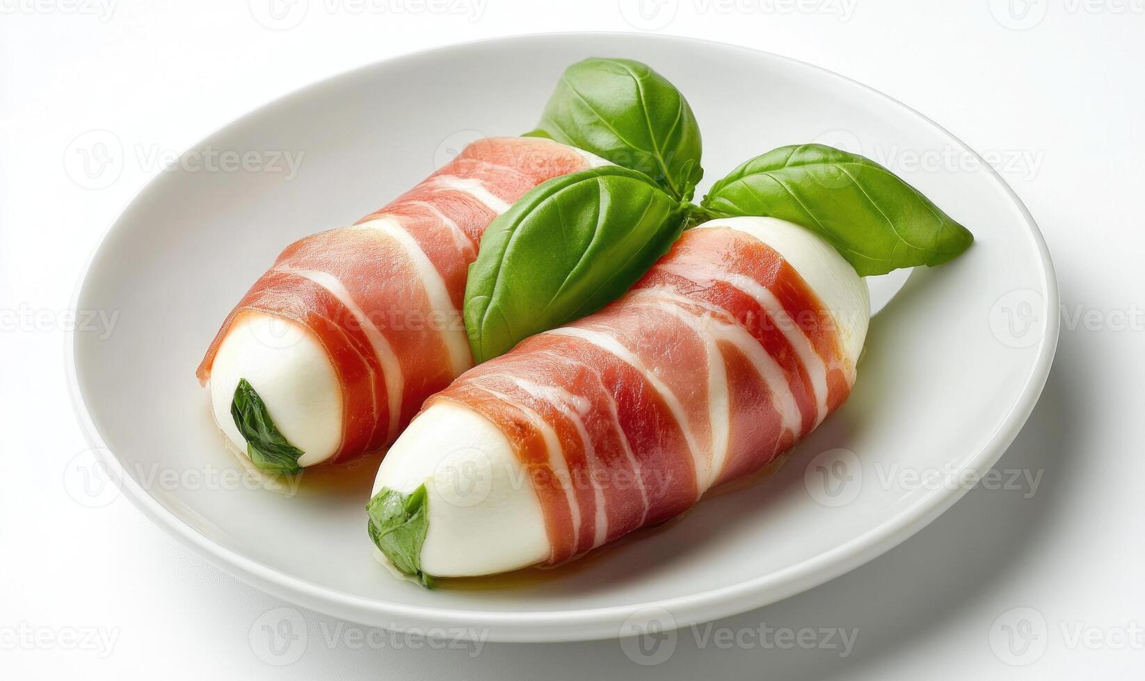 Two pieces of bacon wrapped around a piece of cheese photo