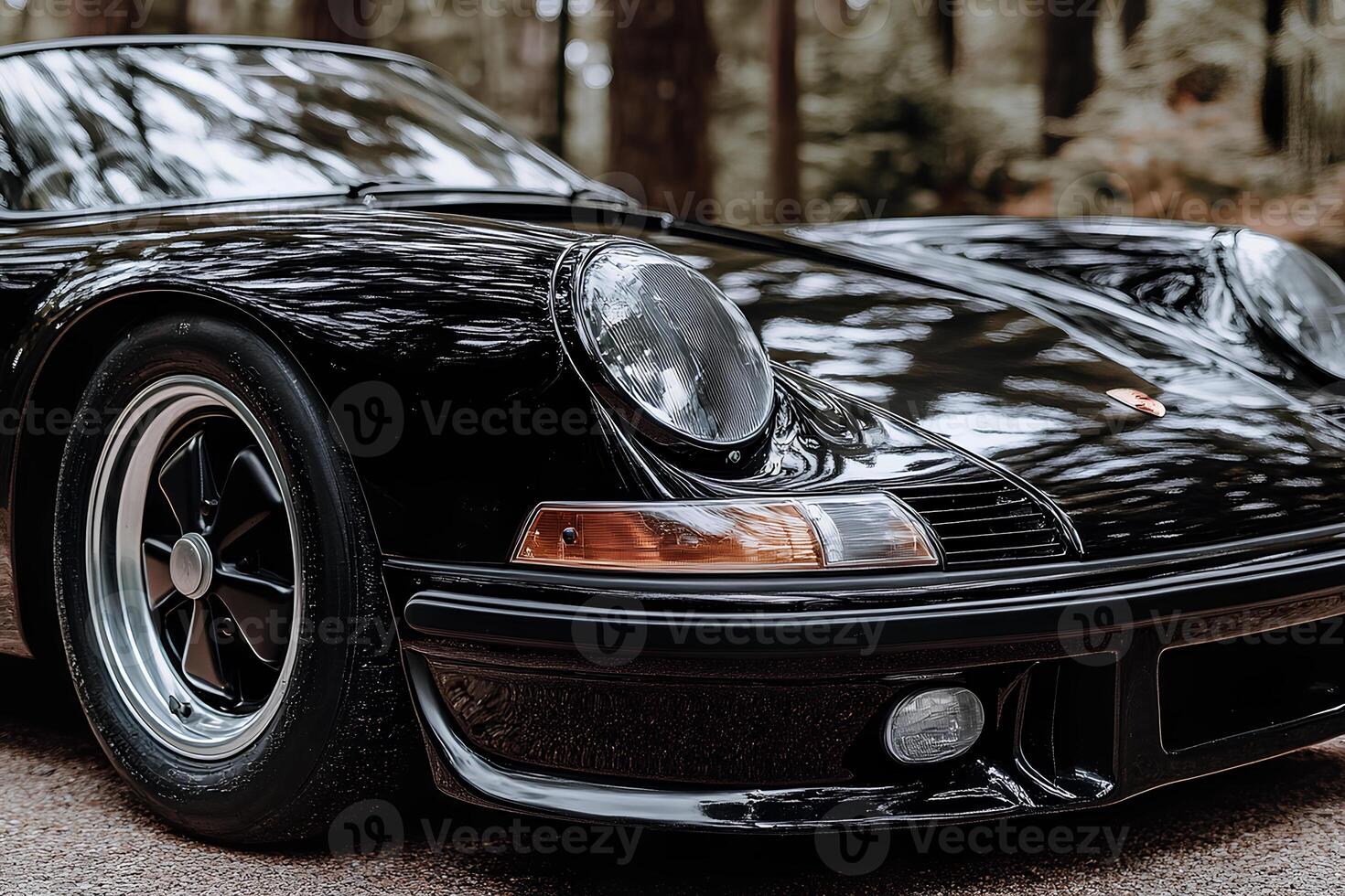 A sleek black Porsche 911 Turbo S showcased at the West Sussex Car Show, highlighting its luxury design and high-performance features photo