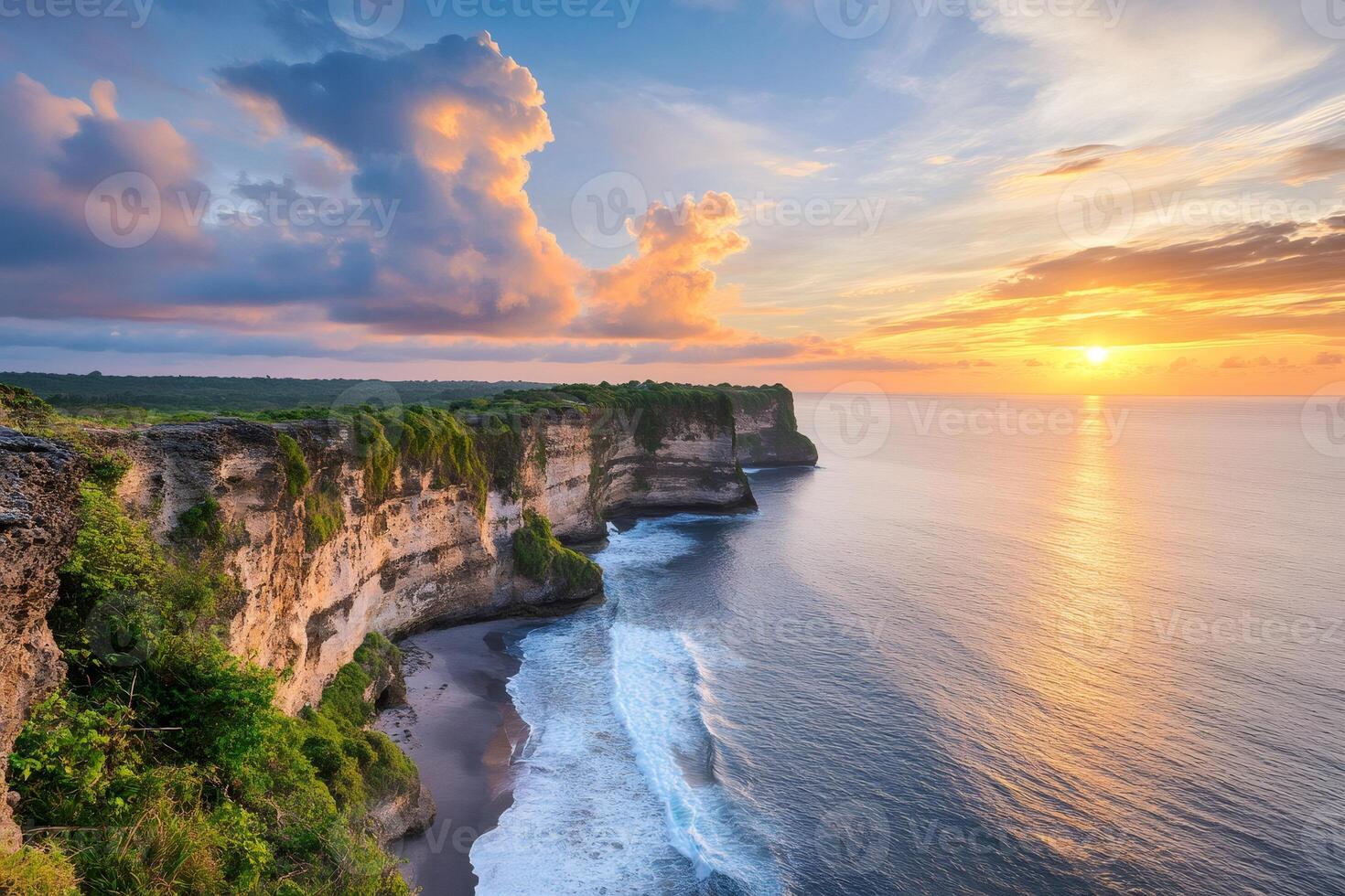 Scenic sunset over Uluwatu Temple cliff in Bali, Indonesia photo
