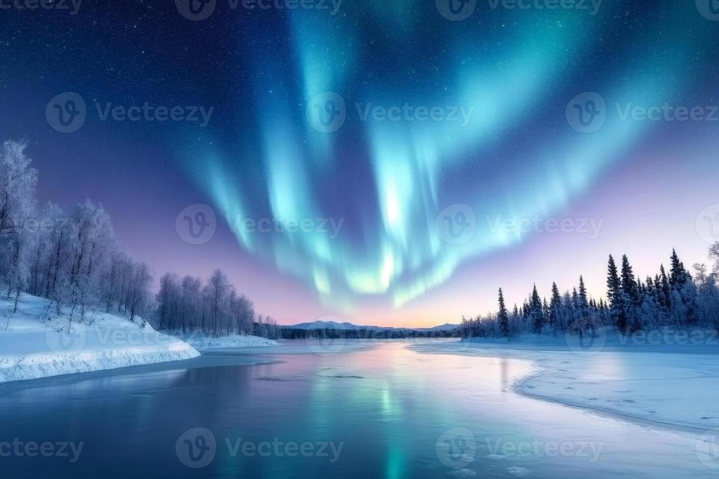 Aurora borealis illuminating snowy landscape with frozen river at twilight photo