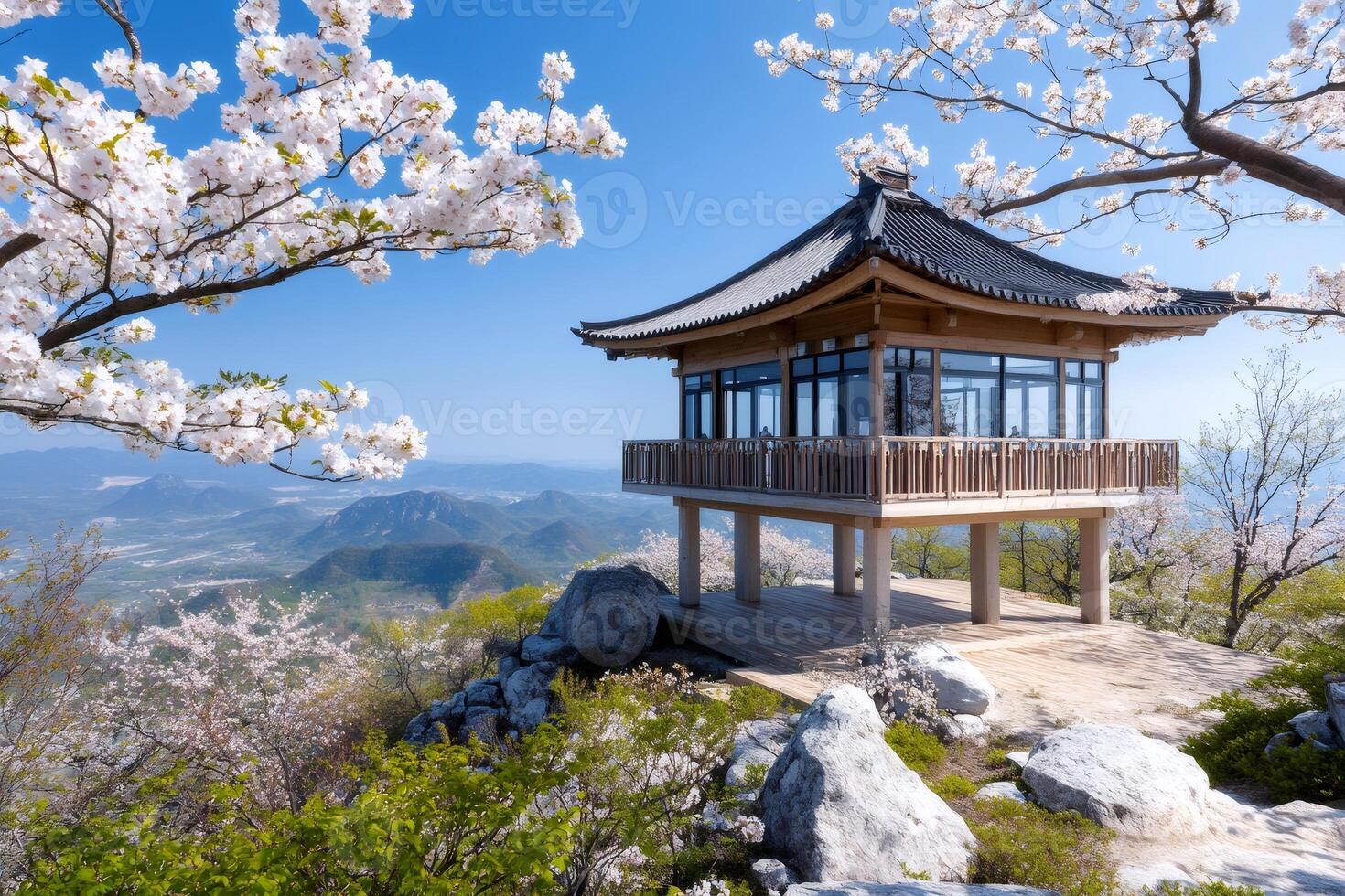 Wooden gazebo overlooking blooming spring valley in South Korea photo