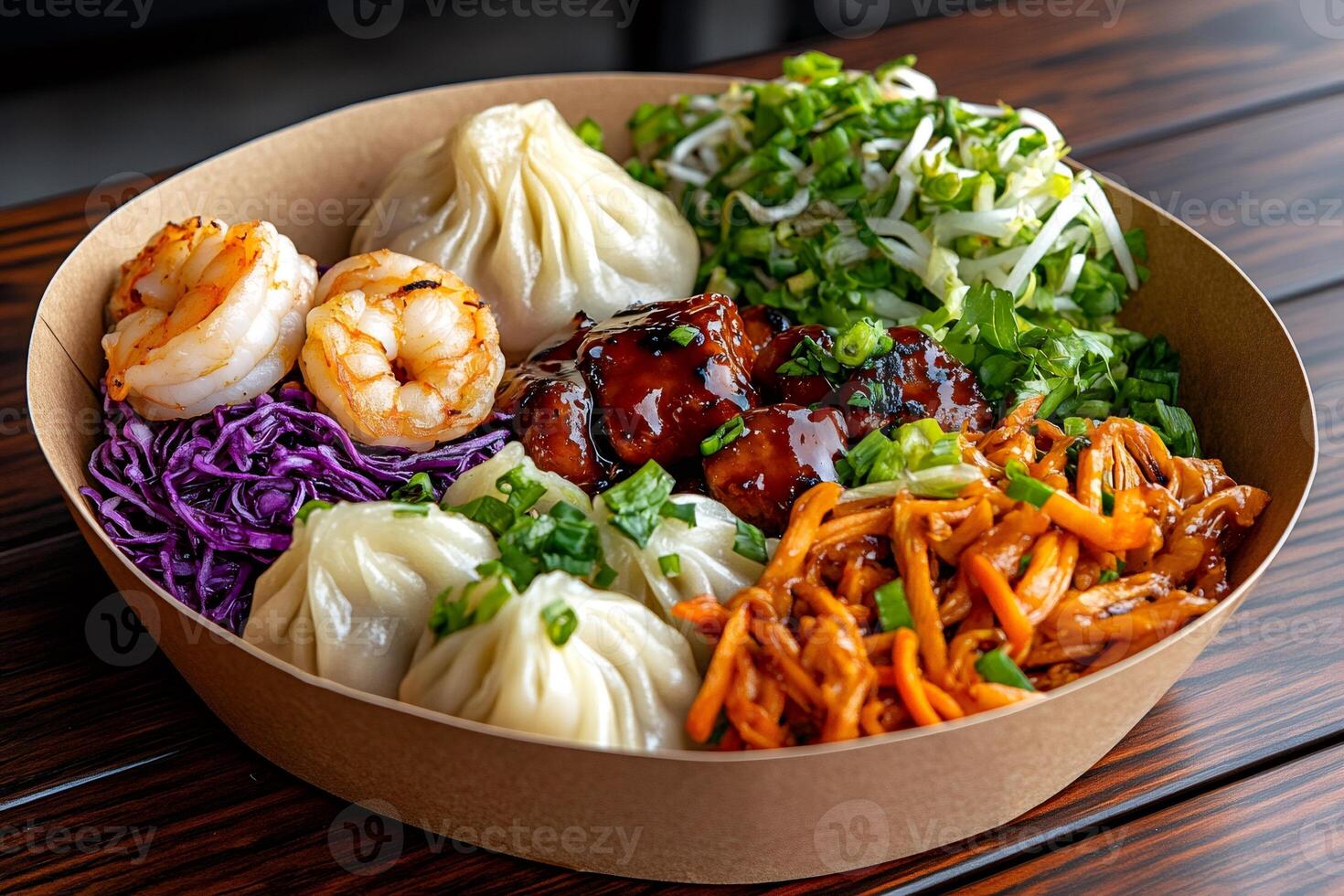 Delicious dumplings, shrimps, teriyaki chicken and vegetables composing a poke bowl photo