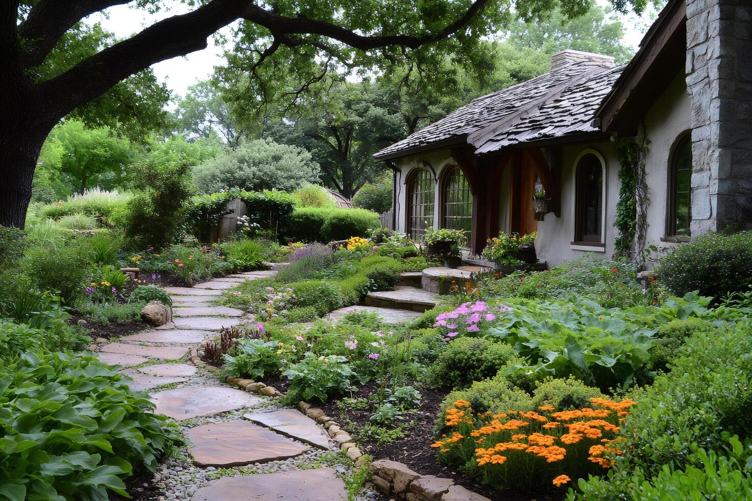 Charming english cottage surrounded by a colorful garden with flagstone pathway photo