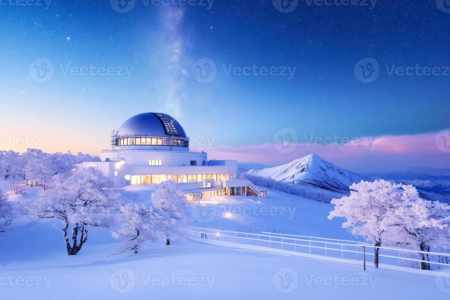 Snow covered astronomical observatory exploring milky way in winter wonderland at dawn photo