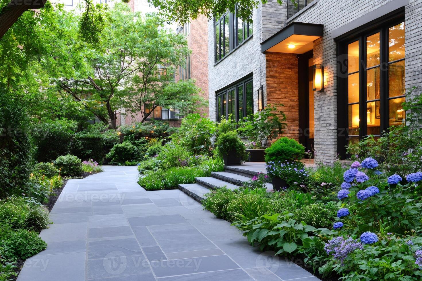 Elegant modern house with landscaped garden featuring stone walkway and lush greenery photo