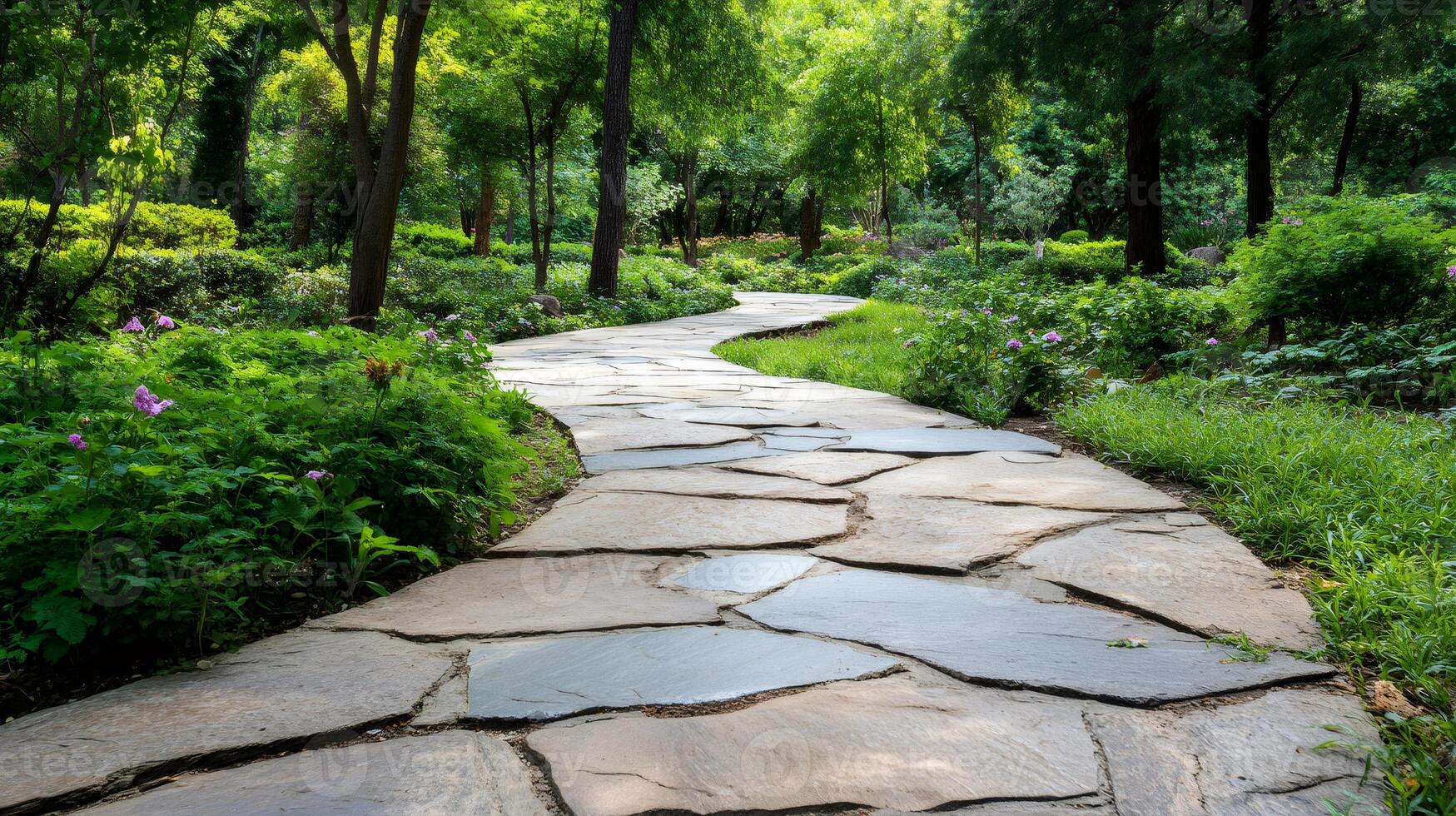 Winding stone path crossing a peaceful green park photo