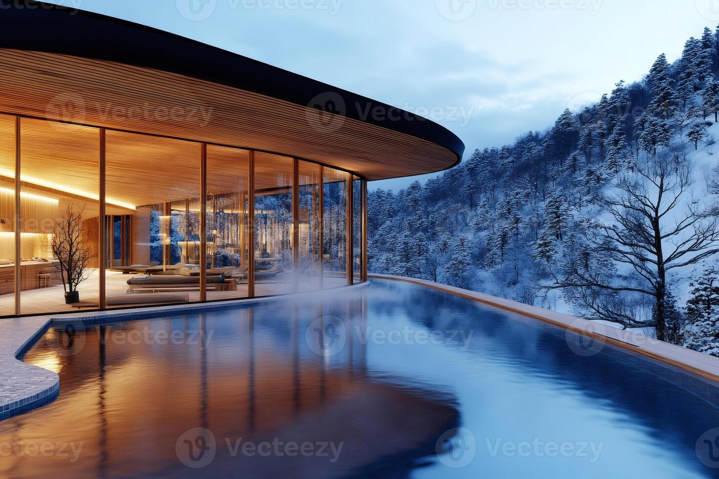 Steaming infinity pool overlooking snowy mountain forest at luxury resort photo
