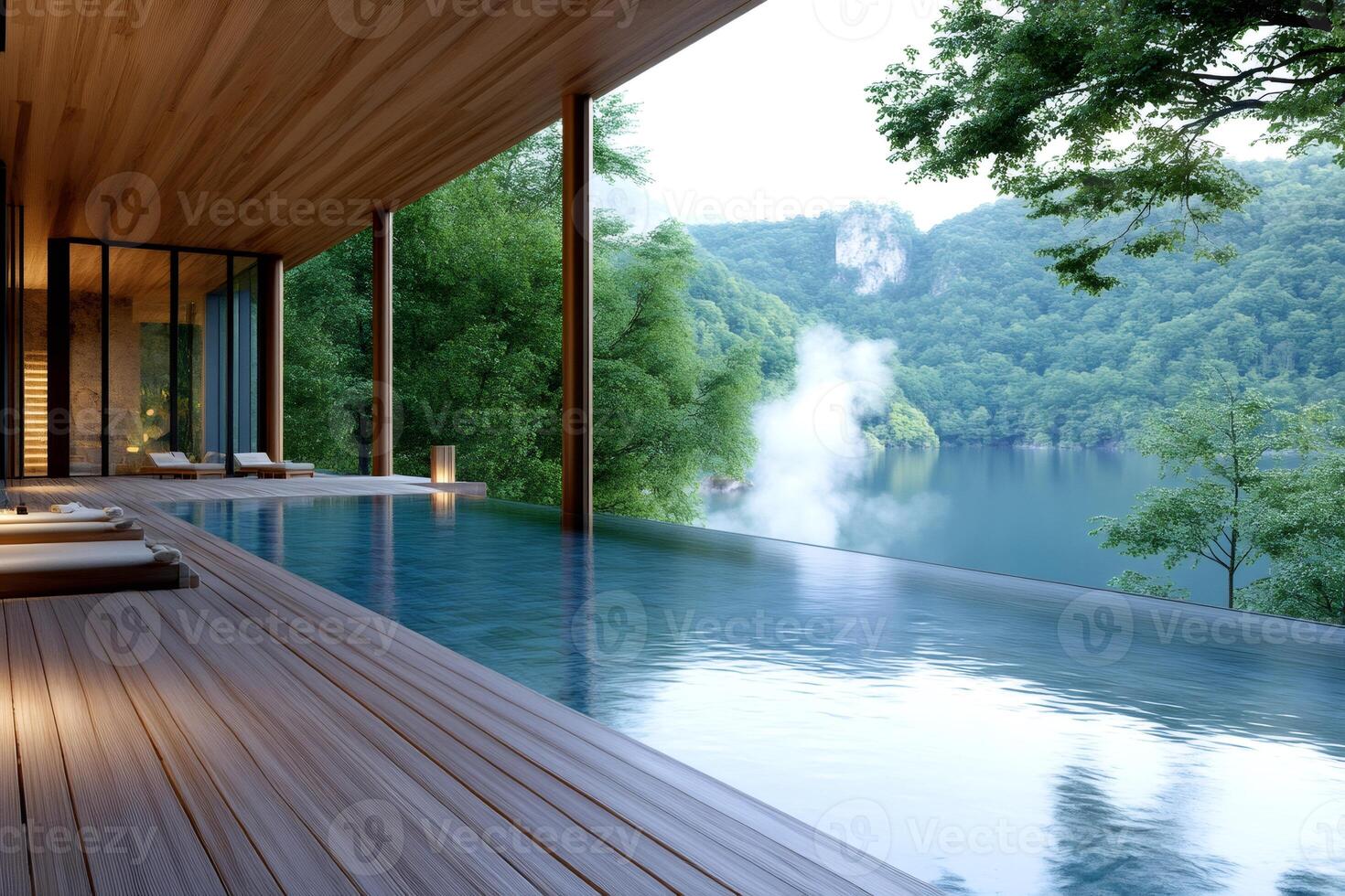 Infinity pool overlooking a lake and forest in a luxury resort photo