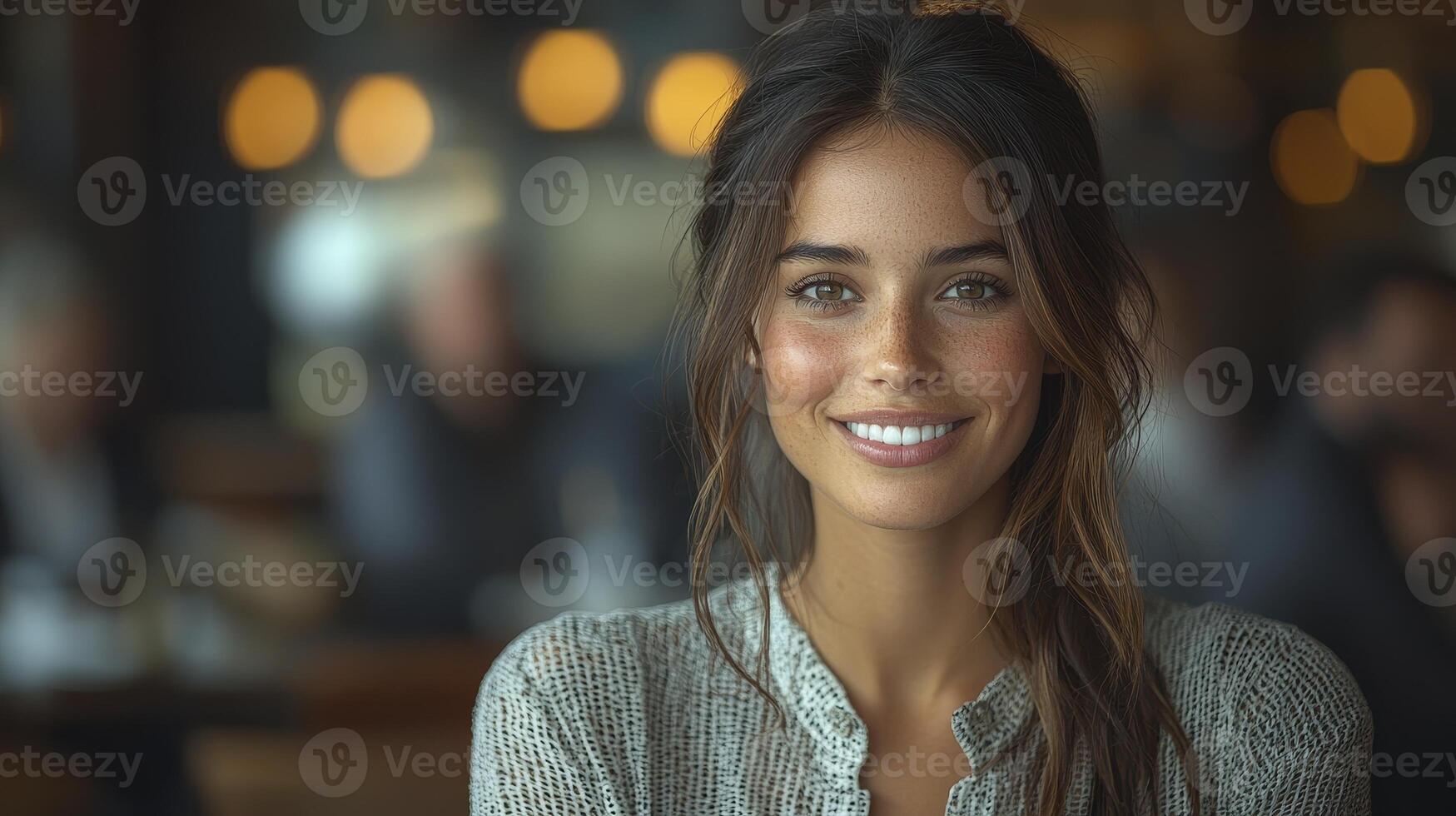 Confident Businesswoman Smiling in Bright, Modern Cafe Environment photo
