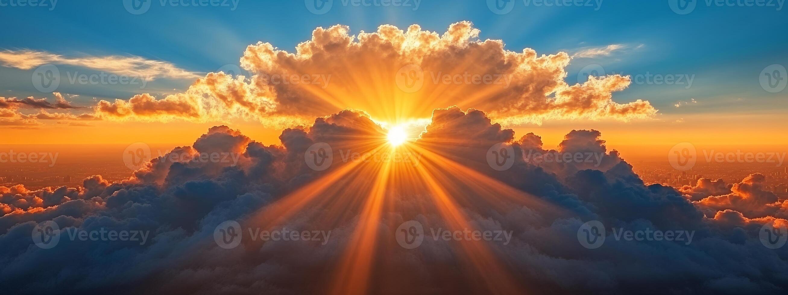 Sun shining through clouds photo