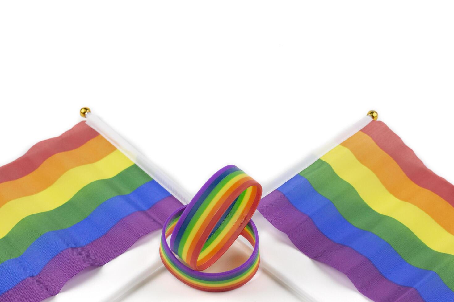 2. Colorful rainbow flag on white background. Concept of cheering LGBT communities all over the world photo
