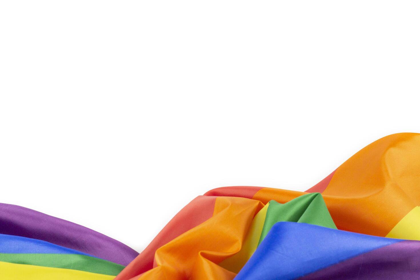 5. Colorful rainbow flag on white background. Concept of cheering LGBT communities all over the world photo