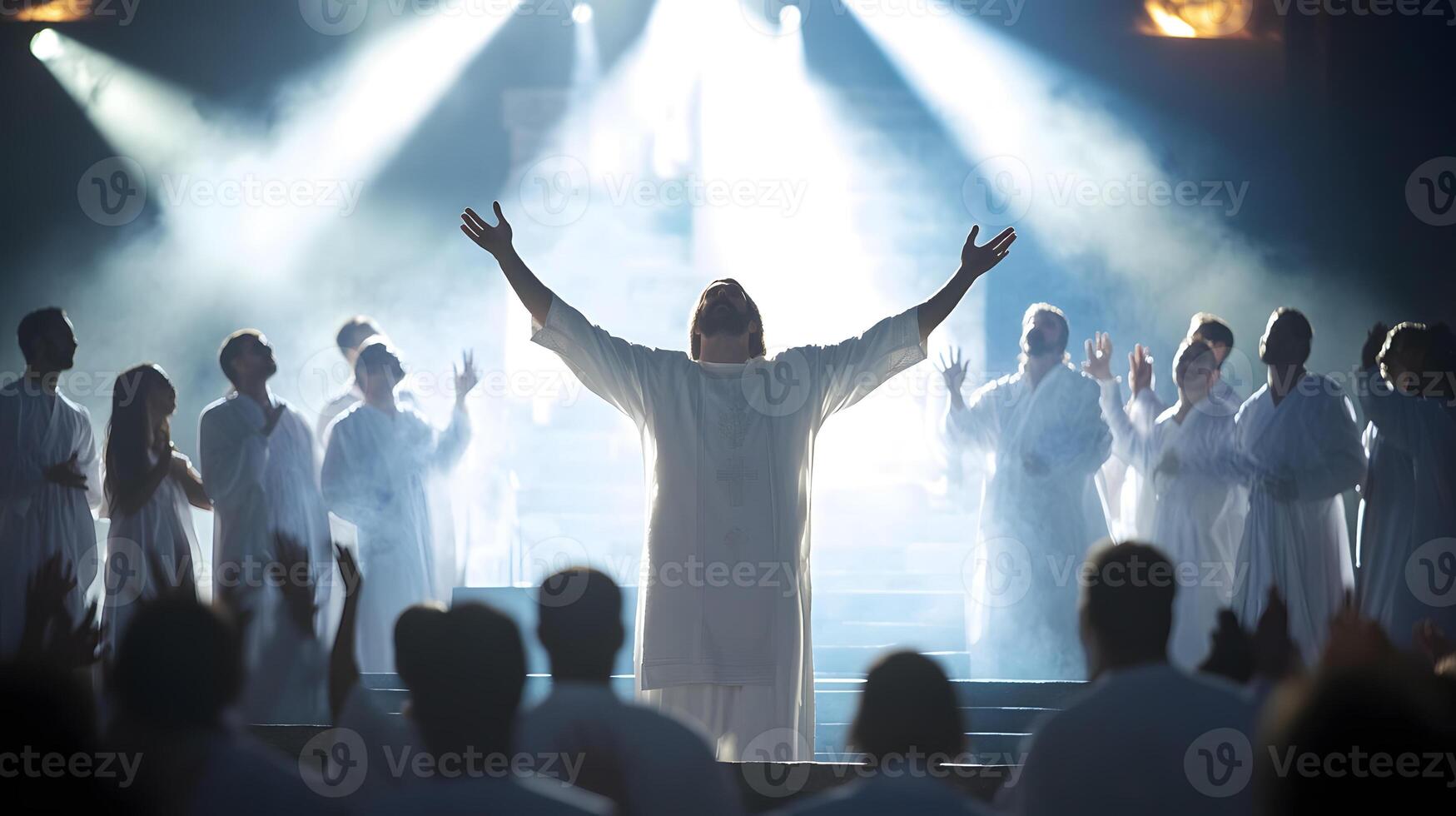 Jesus is standing in front of a crowd of people photo