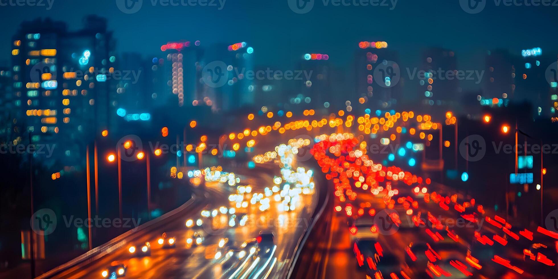 A blurry image of traffic on a highway at night photo
