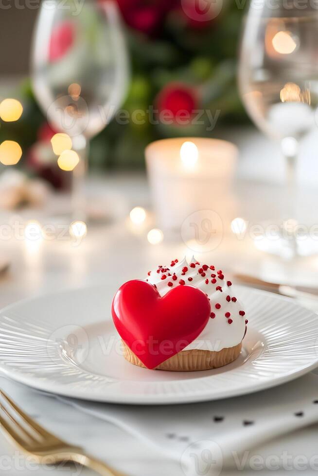A heart shaped cookie on a plate with a candle photo