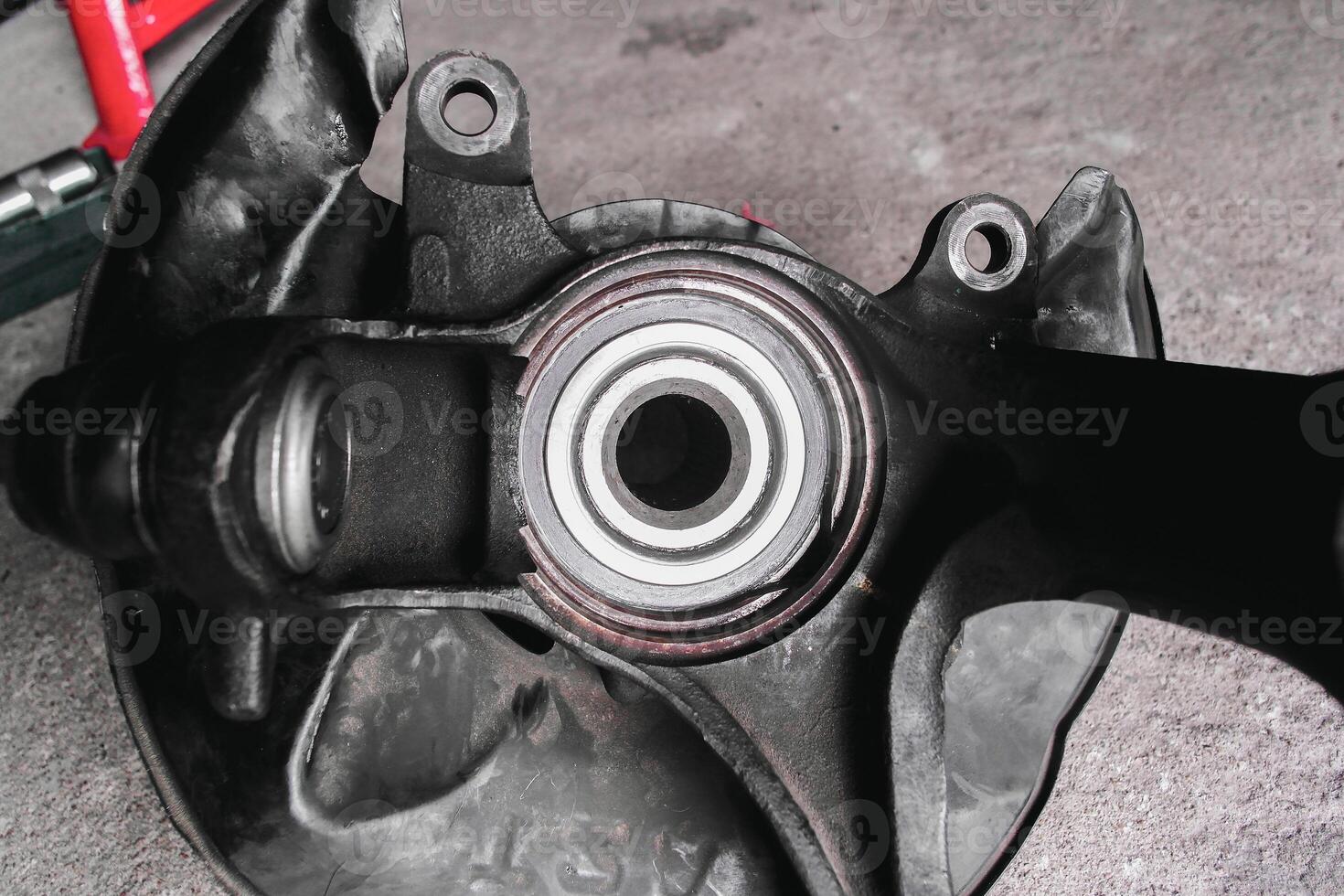 Close-up of a car wheel hub with bearings. Automotive part, likely for repair or maintenance. photo