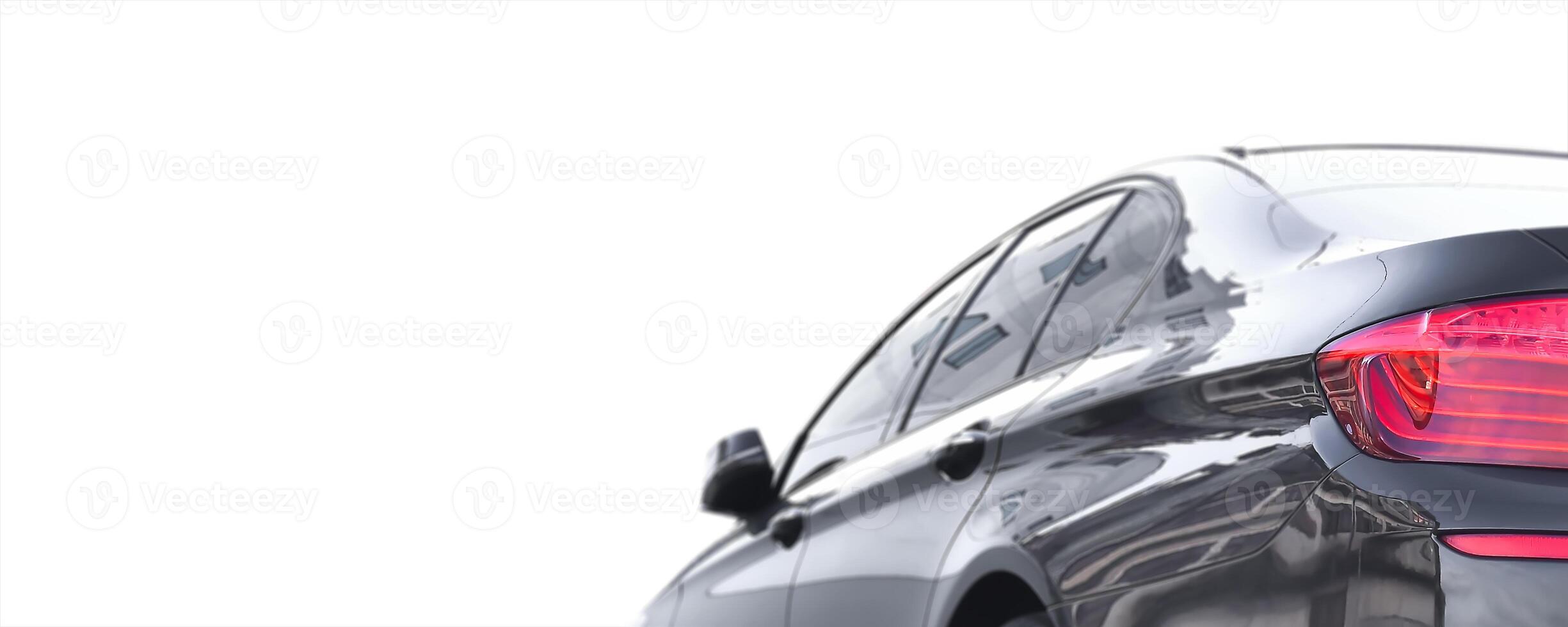 Rear view of sleek black sedan , black car blurred on white background with copy space for text decoration , Automotive concept photo