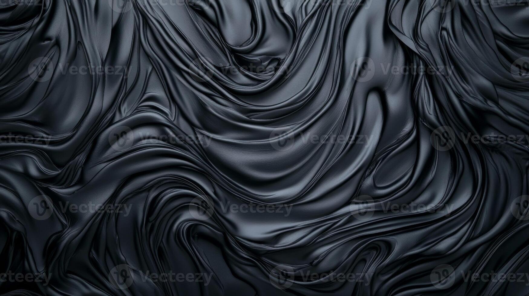 Deep black waves and ripples create a dramatic and textured visual experience photo