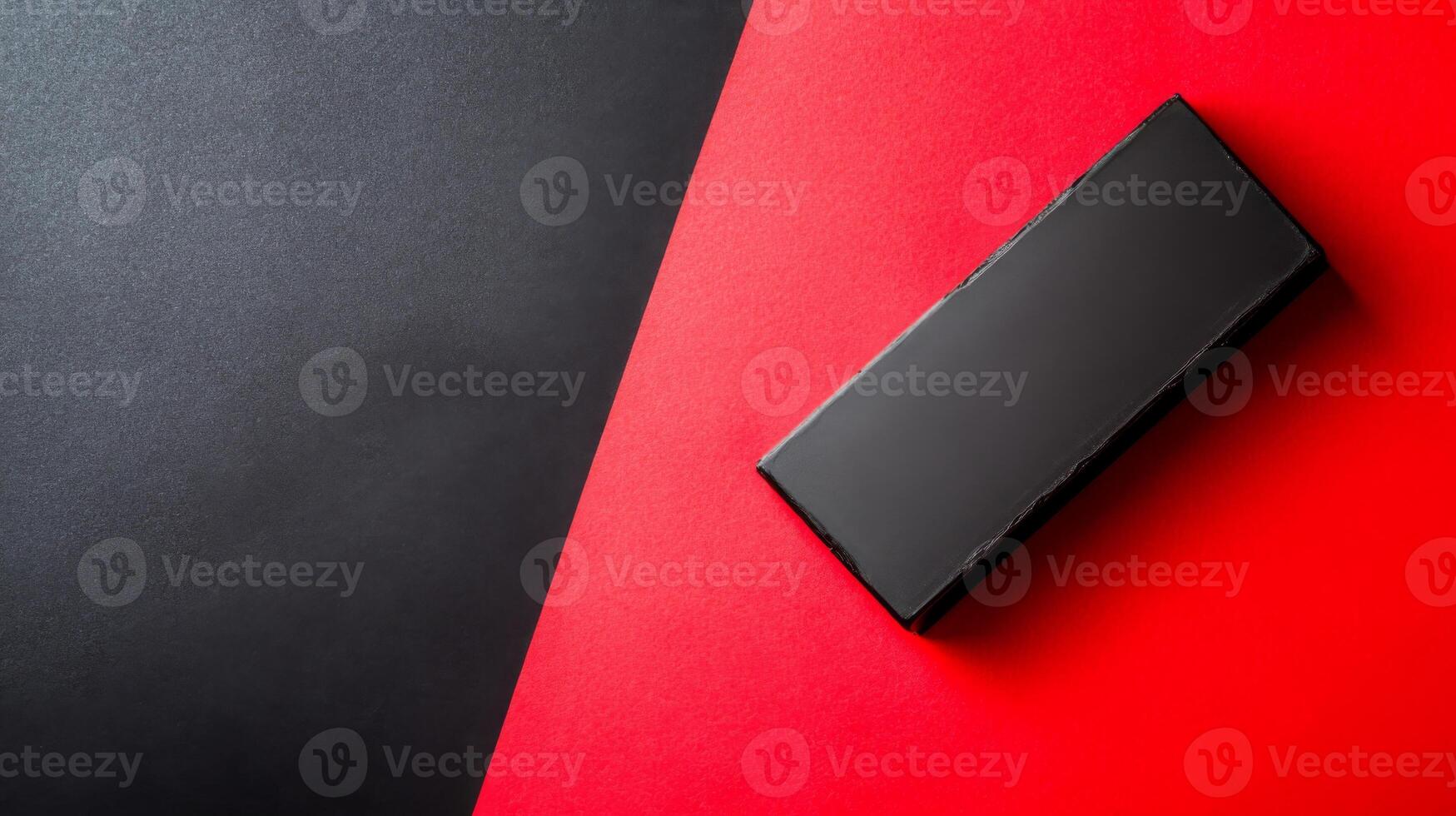 Modern Design Black Shape on Split Red and Gray Plane photo