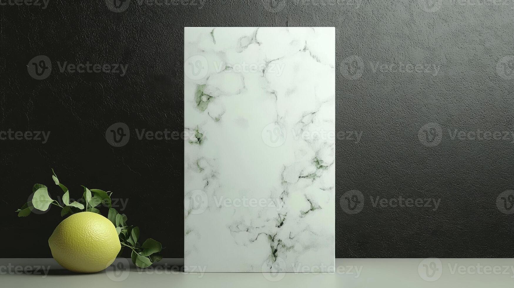 Marble Pattern Tile with Lemon and Leaves on Table photo