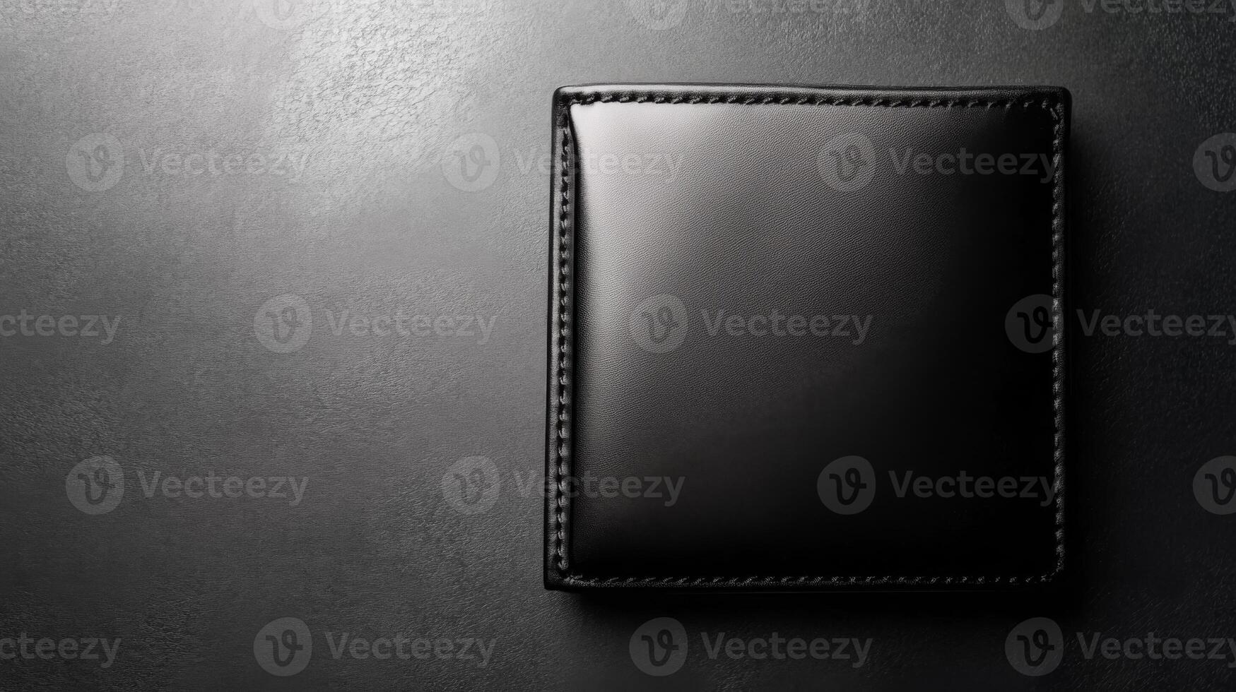 Black Leather Wallet Displayed on a Dark Surface photo