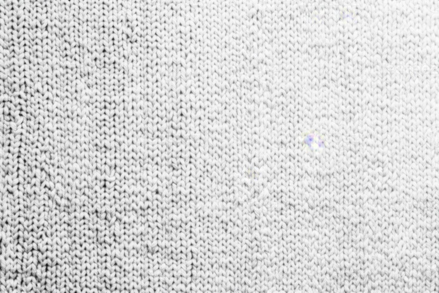 Detailed White Knitted Fabric with Visible Texture photo