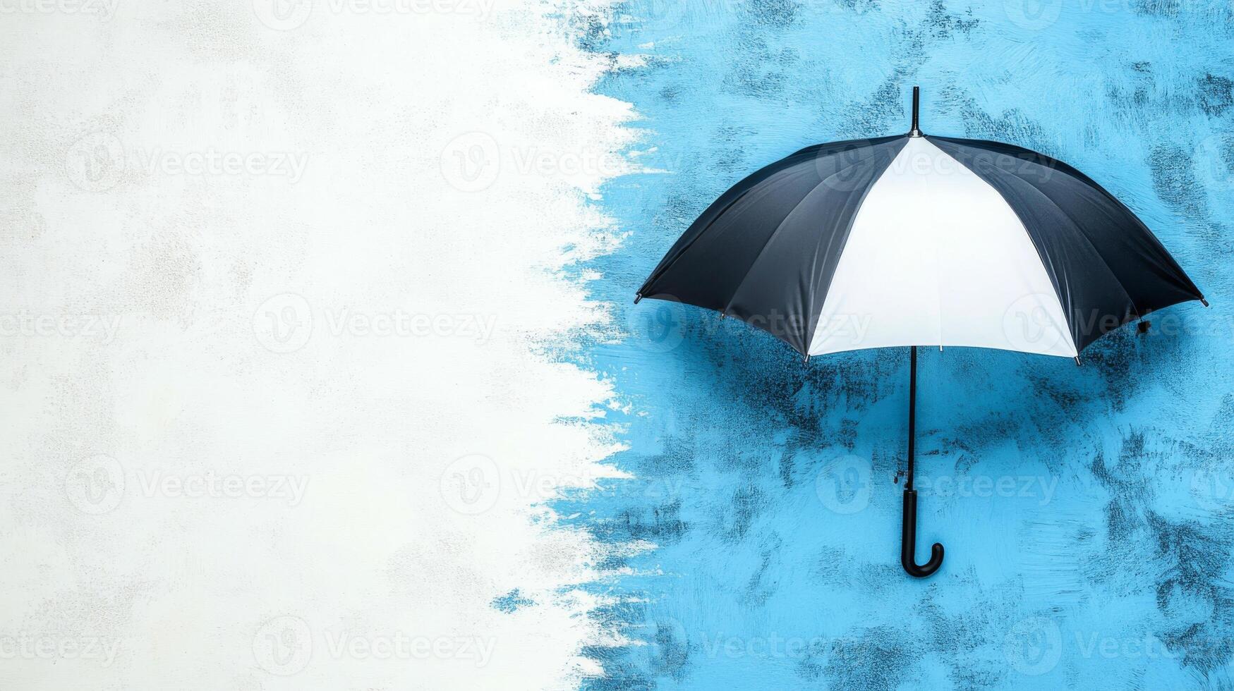 Black and White Umbrella on a Blue Wall photo
